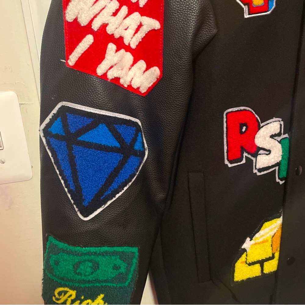 Designer popeyes varsity jacket size Large.